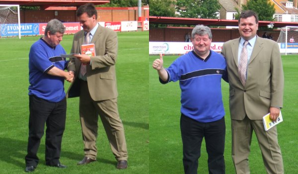 Charlie Logan (left) receives his tickets from Mark Anderson (right)