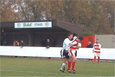 Greg Ball plays whilst Danny Bolt stands and watches