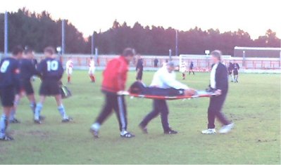 Andy Woollen gets stretchered off