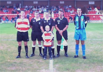 Mascot, captains and officials