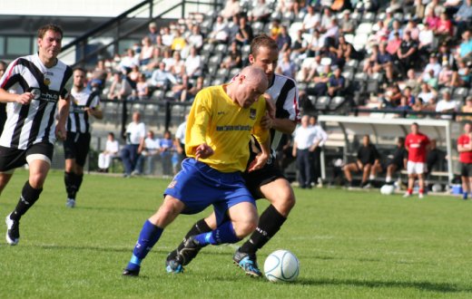 Wes Goggin battles to keep the ball