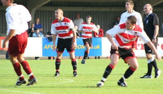 Sobihy and Cartwright look on as Traynor strikes a second