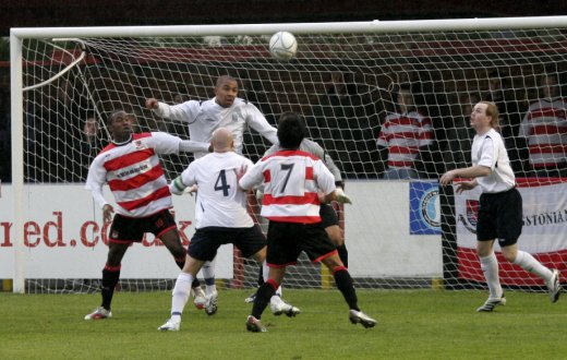 David Shin and Saheed Sankoh in attack