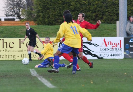 Simon Huckle pokes through a cross