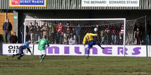 Jason Turley beaten by the ball as the goal beckons