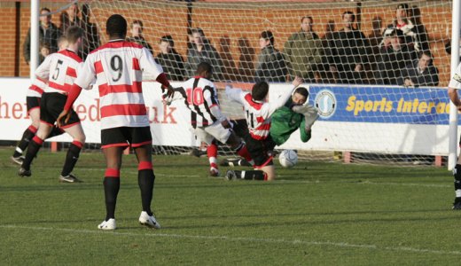 Luke Garrard makes an early save