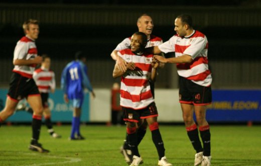 Teammates congratulate Dean Lodge