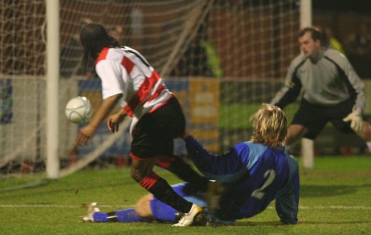 Dean Lodge hits the outside of the post