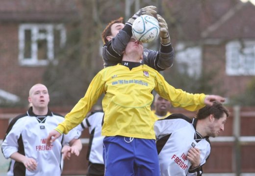 Jon Ashwood wraps his arms around NJ Lampton's head