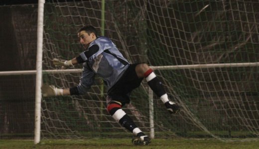 Luke Garrard dives for the penalty