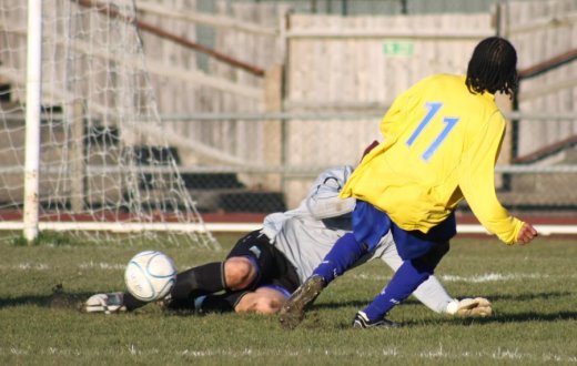 Dean Lodge denied by goalkeeper Rob Webb