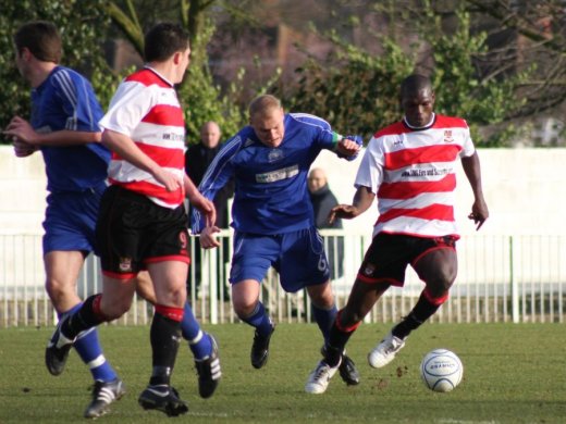 Shawn Beveney holding off Scott Corbett