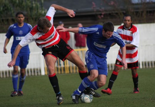 Gavin Cartwright tussles for the ball