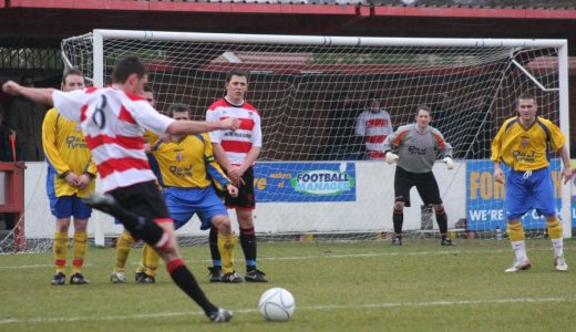 Neil Lampton strikes a free kick