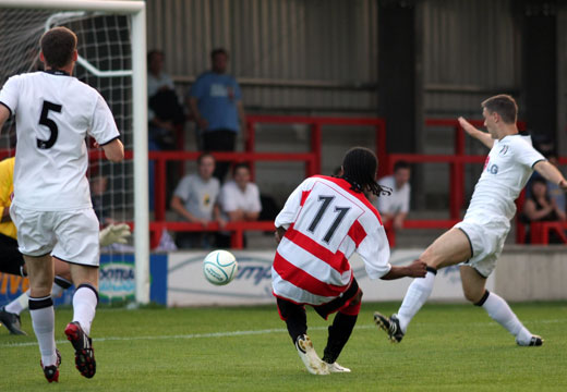 Dean Lodge hits the post