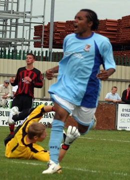 Lodge follows up his shot to roll in the opening goal