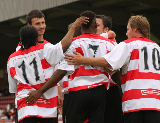 Teammates congratulate Tony Bedeau