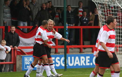 Jon Coke congratulates Tommy Williams on his goal