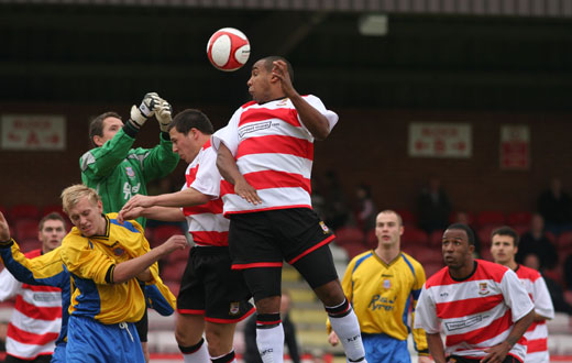 Adam Thompson rises for the ball