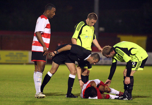 Dean Lodge following a tackle by Tommy Moorhouse