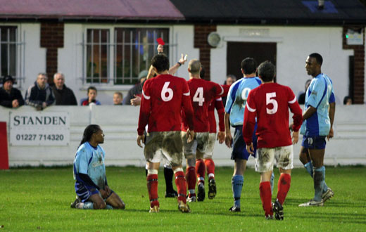 Clark Gooding sees red for a foul on Dean Lodge