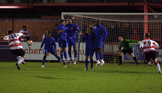 Tom Dilloway fires in the fifth from a free kick