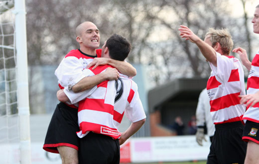 Jamie Byatt congratulates goalscorer Bobby Traynor