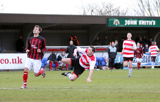 Bobby Traynor lobs the opening goal