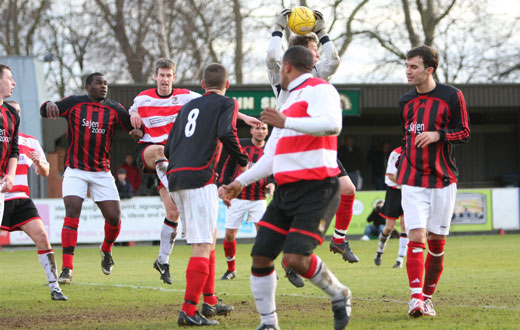 Action in front of the Sittinbourne goal