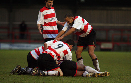 Kingstonian players celebrate a Carl Wilson-Denis goal