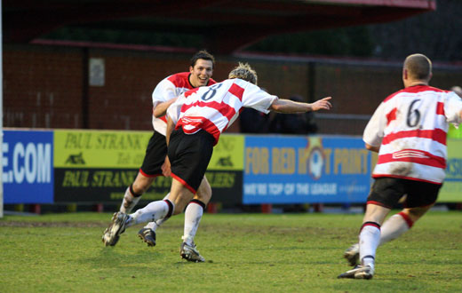 Tommy Williams celebrates scoring the fourth goal