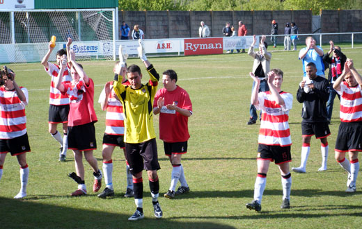 The teams line up before the match