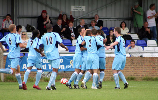 Teammates congratulate Lewis Cook