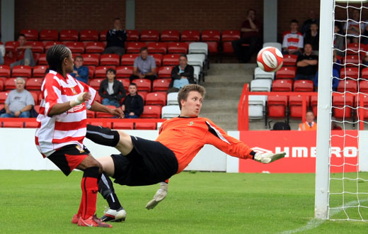 Dean Lodge strikes against the post