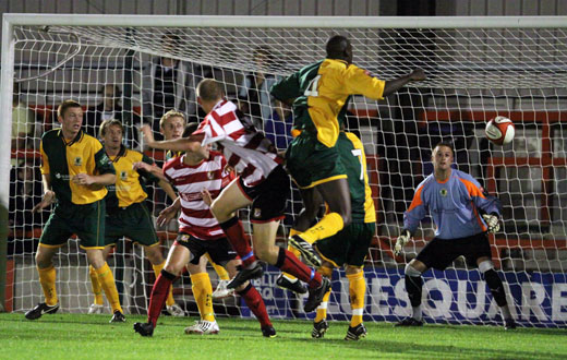 Simon Huckle heads in the first goal