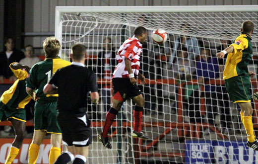 Karl Beckford heads in the second goal