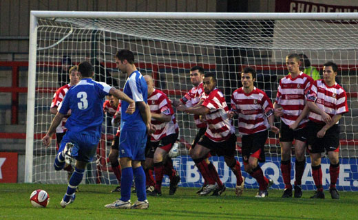 Chippenham take a free kick on the edge of the box