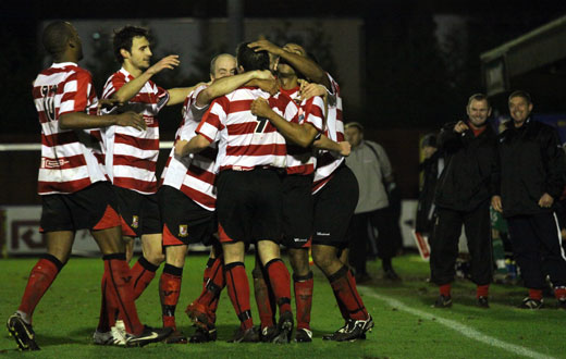 The Kingstonian players celebrate