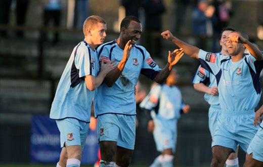 ...and is congratulated by his team mates