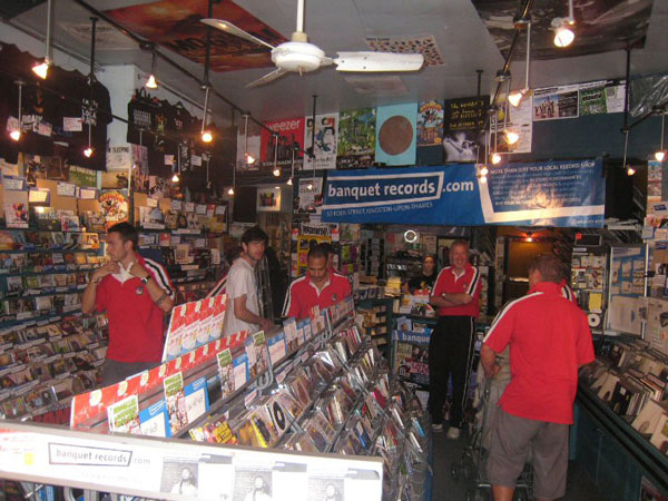 Kingstonian management and players browsing through the Banquet Records store at 52 Eden Street in Kingston